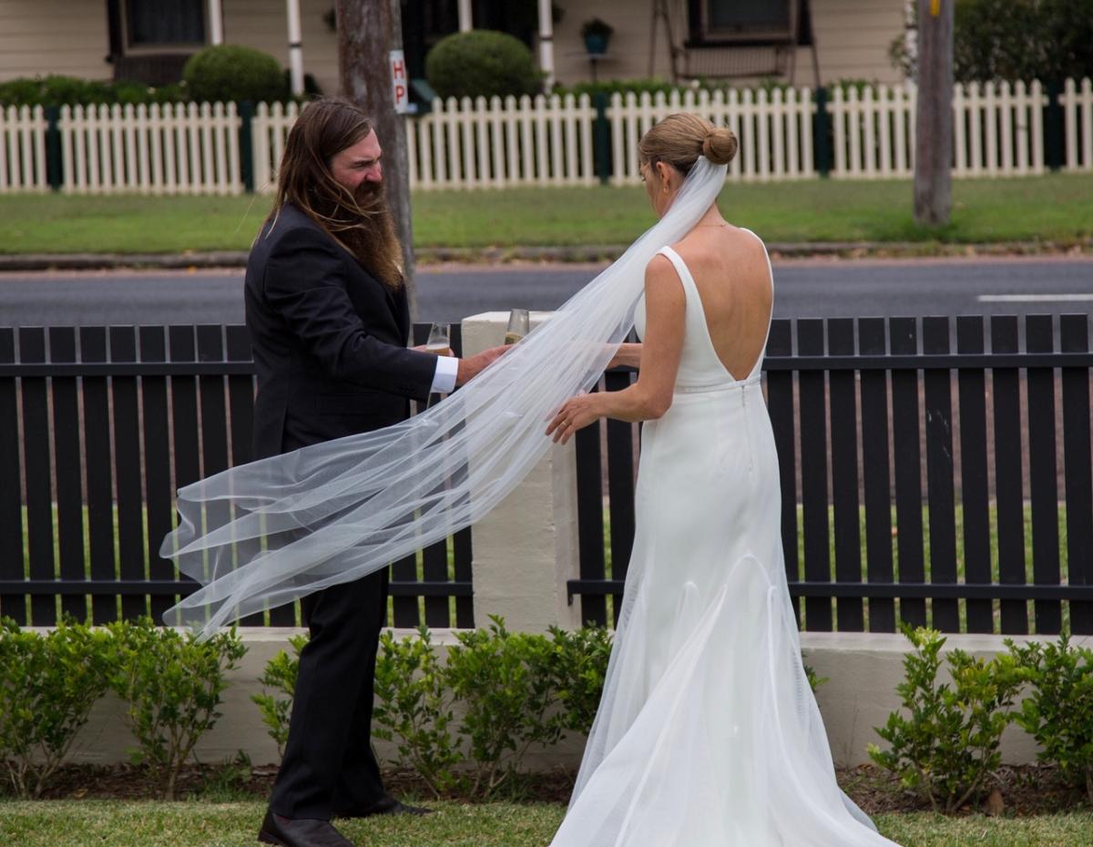 Bride and groom celebrating their COVID-19 wedding