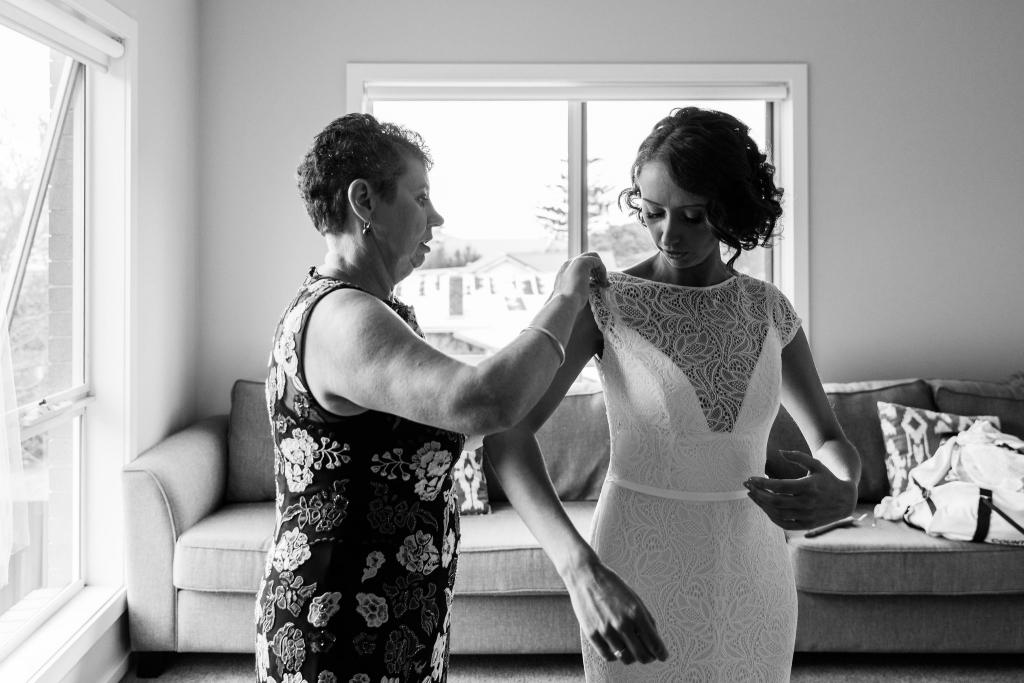 KWH bride Amy getting ready with her mum on her wedding day, wearing the Jemma gown, a bohemian style lace wedding dress.