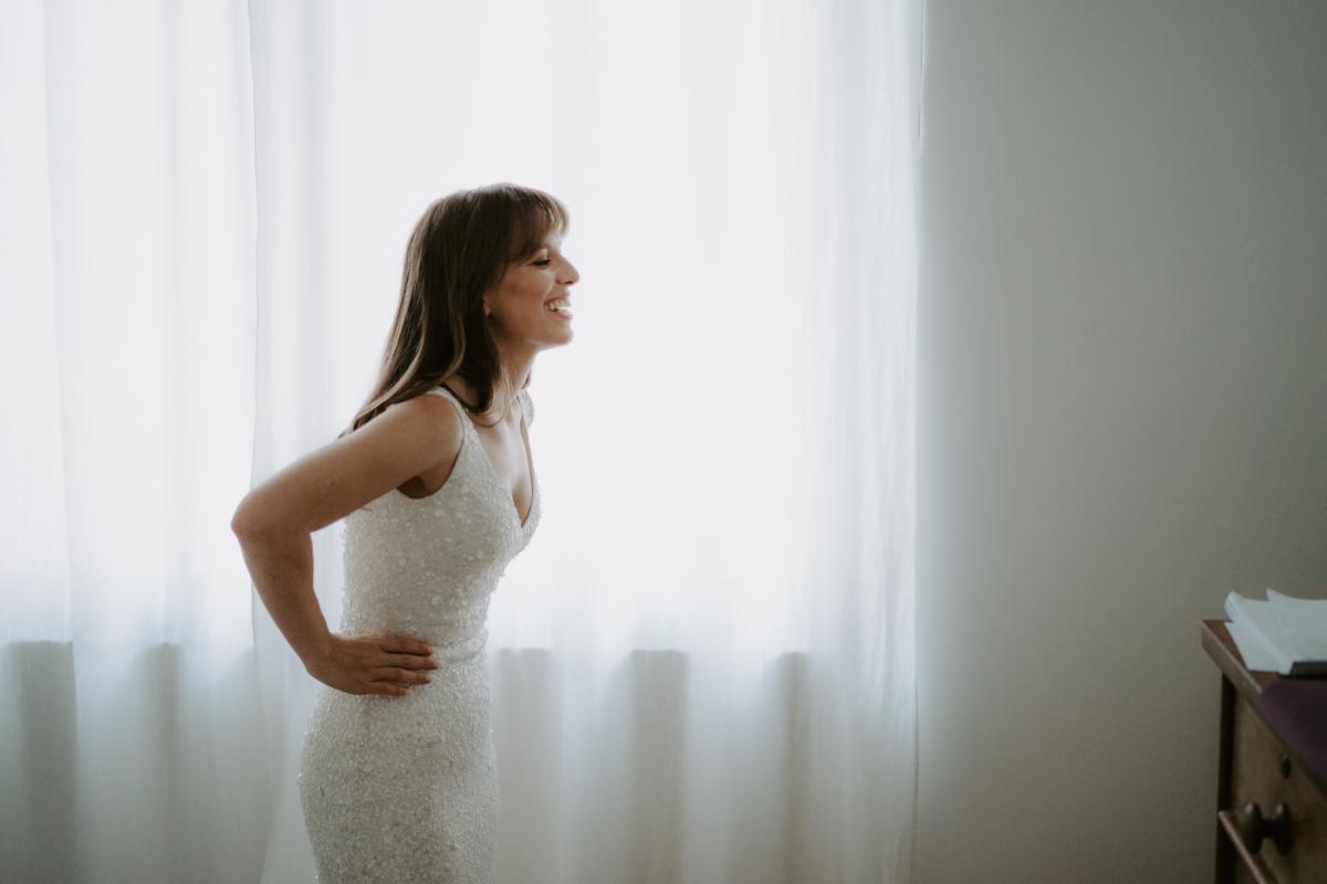 Bride Ania in Karen Willis Holmes Lola Wedding dress getting ready