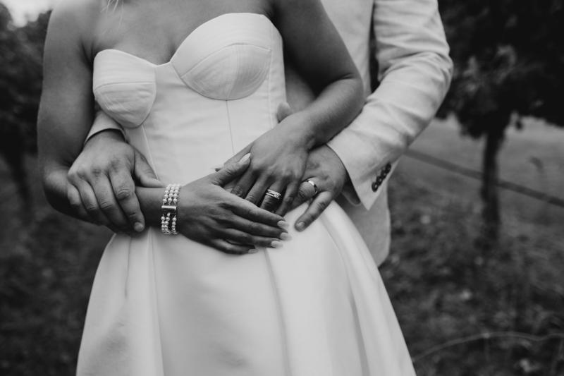 Real bride Brennah wears the Bespoke Blake Camille wedding dress; featuring a sweetheart neckline and traditional skirt by Karen Willis Holmes.