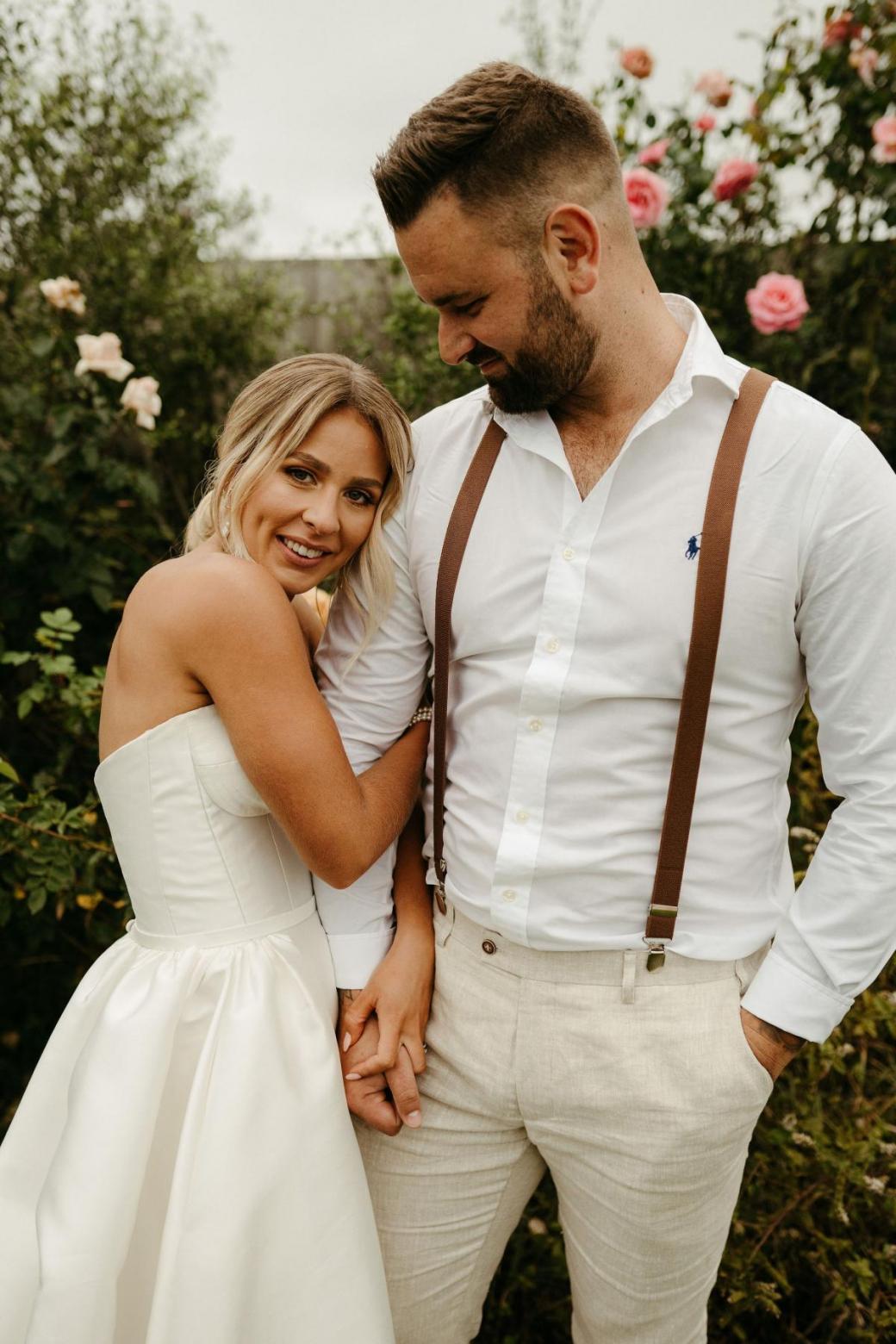 Real bride Brennah wears the Bespoke Blake Camille wedding dress; featuring a sweetheart neckline and traditional skirt by Karen Willis Holmes.
