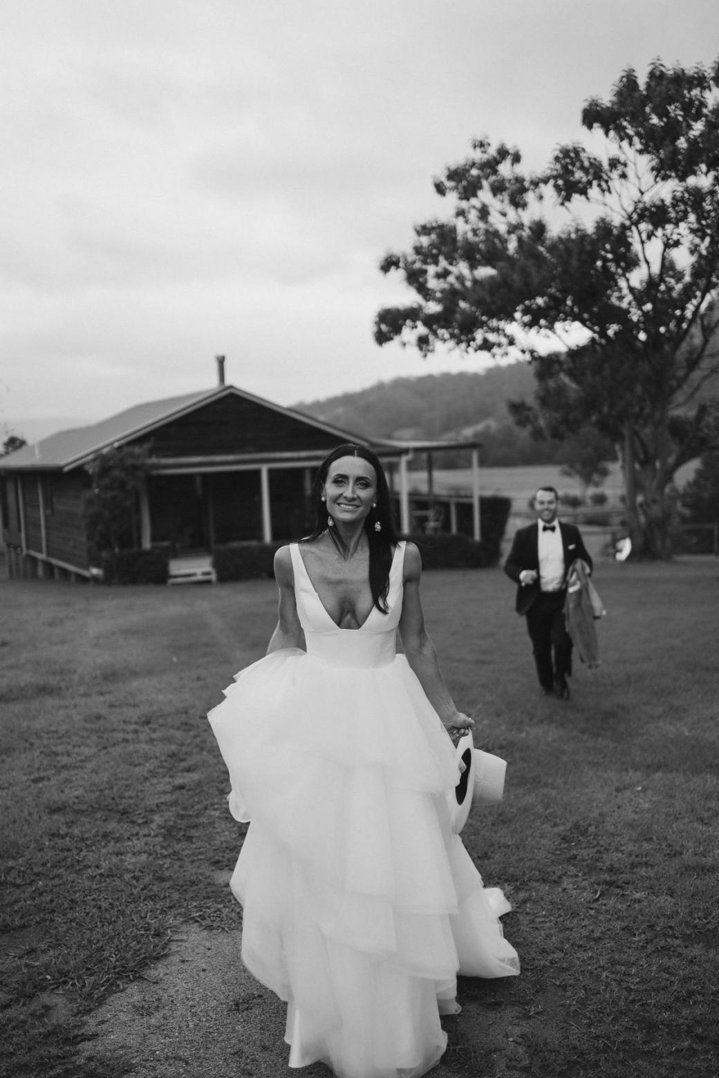 Real bride Sarah wears the Taryn Marina gown, a Bespoke wedding dress by Karen Willis Holmes.