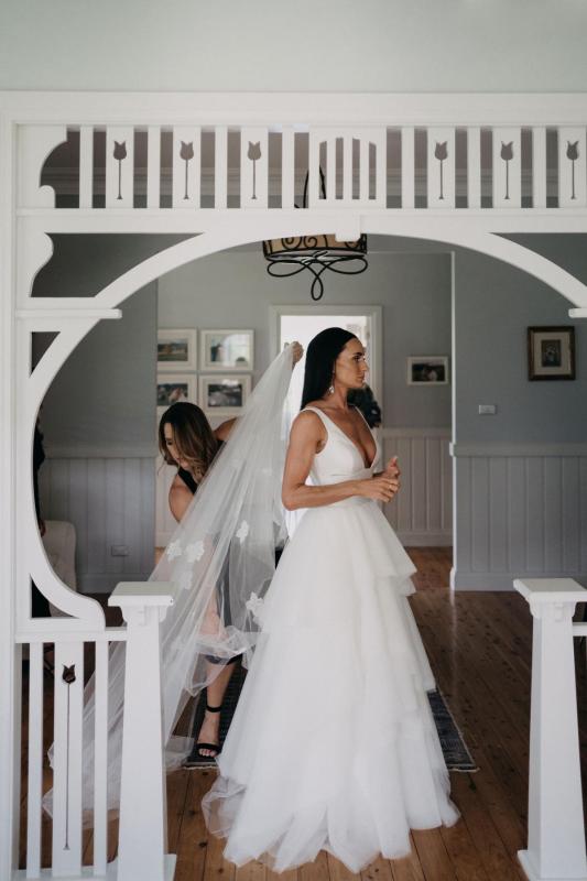 Real bride Sarah wears the Taryn Marina combo, a Bespoke wedding dress for the modern bride by Karen Willis Holmes.