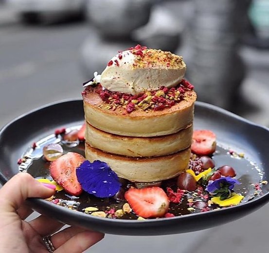 Two Birds One Stone Cafe South Yarra; pancakes and fruit.