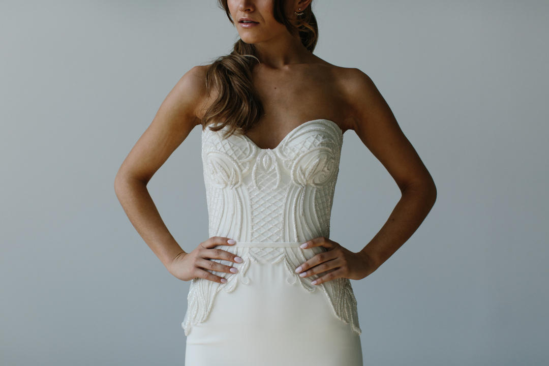 Model wears Jessamine Strapless sweetheart neckline wedding dress style embellished by Karen Willis Holmes