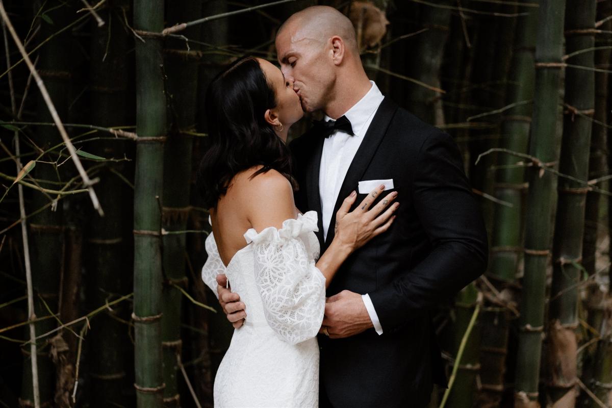 Real bride Lidia wears the Vivienne wedding dress, a lace wedding dress with balloon sleeves by Kare Willis Holmes for the boho bride