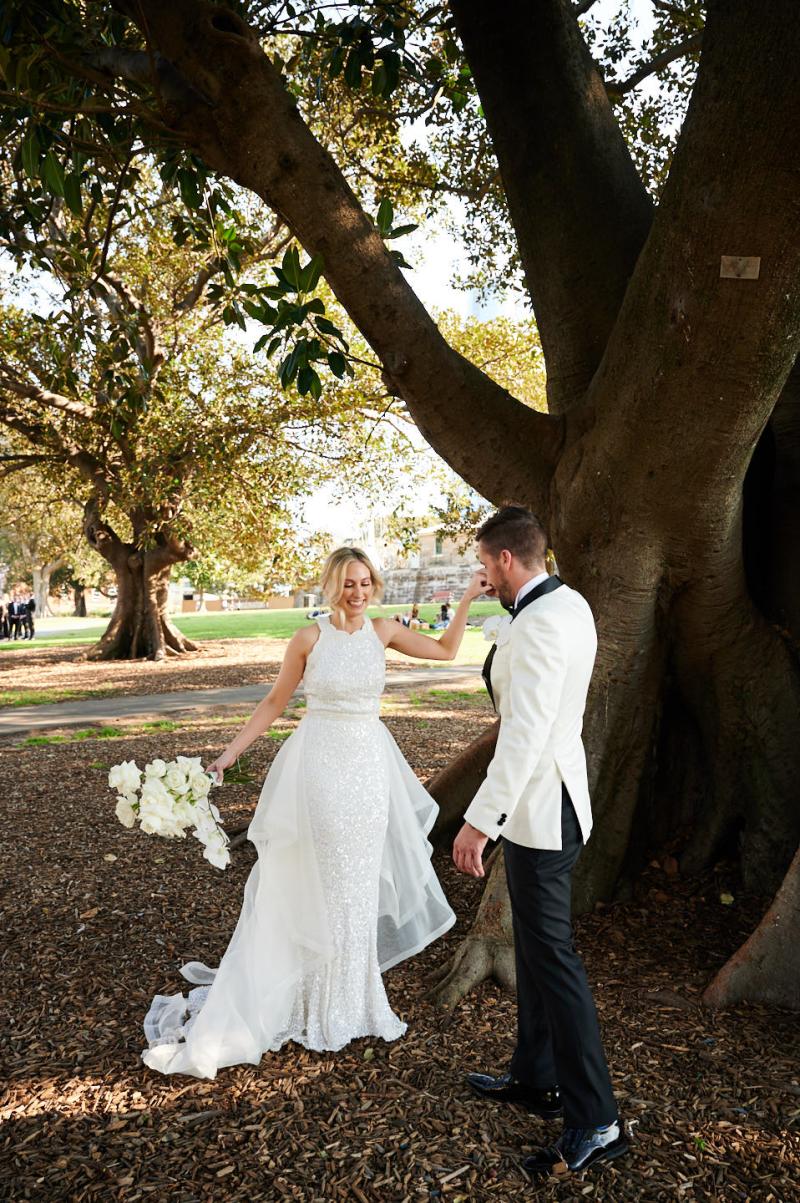 Real bride Claire getting ready for her Balmoral Beach wedding, wearing the Cindy gown, a beaded halterneck wedding dress by Karen Willis Holmes.