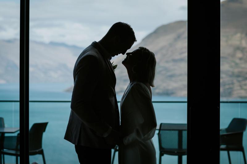 KWH bride Lauren and husband Will at their ceremony. Samantha wears the low back Nikki wedding dress with sleeves.