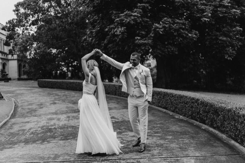 Real bride Maddi with husban Kurtley at alter, wedding featured on Vogue bridal, bride wearing the Daisy gown by Karen Willis Holmes.