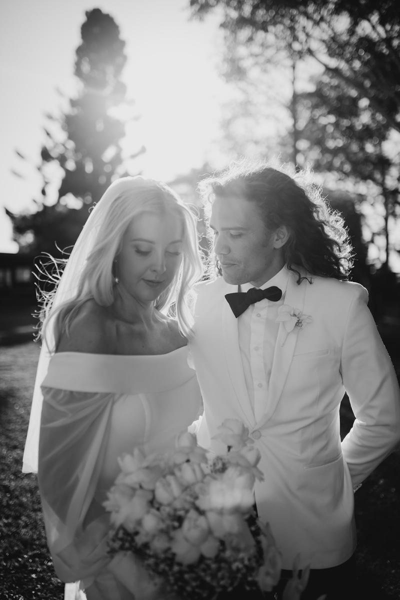 Real bride Hannah wears the Lauren gown; an off shoulder wedding dress with customised Nikki sleeves by Karen Willis Holmes