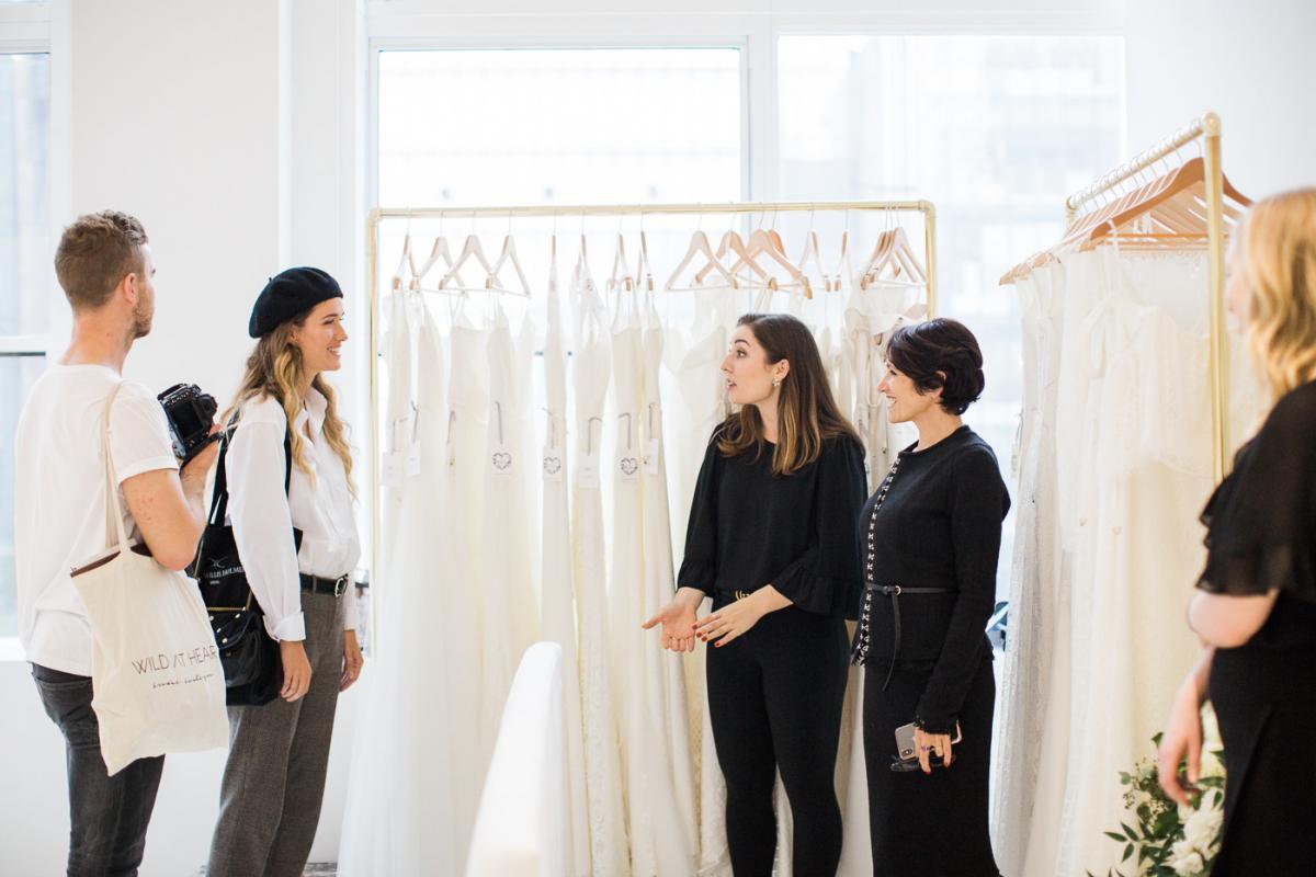 Karen talks to clients at One Fine Day Bridal Market