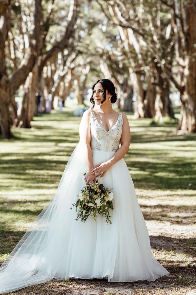 Real bride Stef wears the Sophie gown to country wedding; an embellished a-line bespoke wedding dress by Karen Willis Holmes.