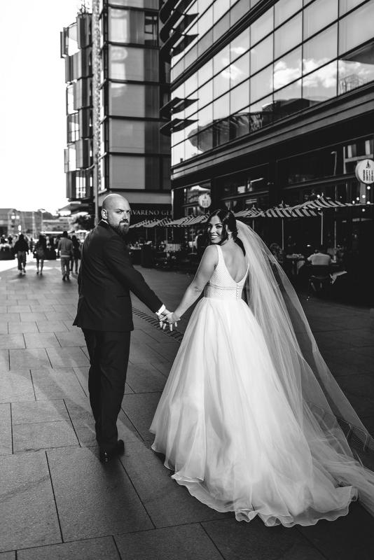 Real bride Stef wears the Sophie gown to city wedding; an embellished bespoke a-line wedding dress by Karen Willis Holmes.