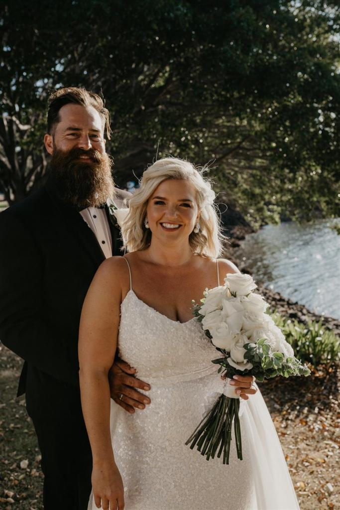 Curvy real bride Leanne wears the Anya gown; a beaded spaghetti strap wedding dress by Karen Willis holmes.