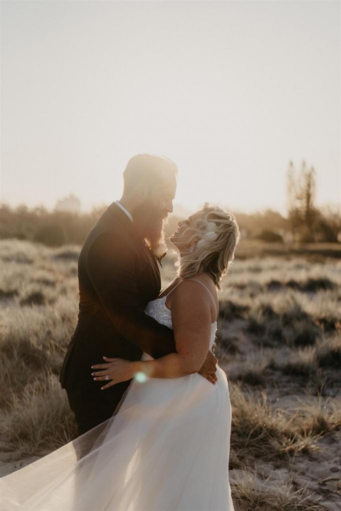 Curvy real bride Leanne wears the Anya gown; a beaded spaghetti strap wedding dress by Karen Willis holmes.
