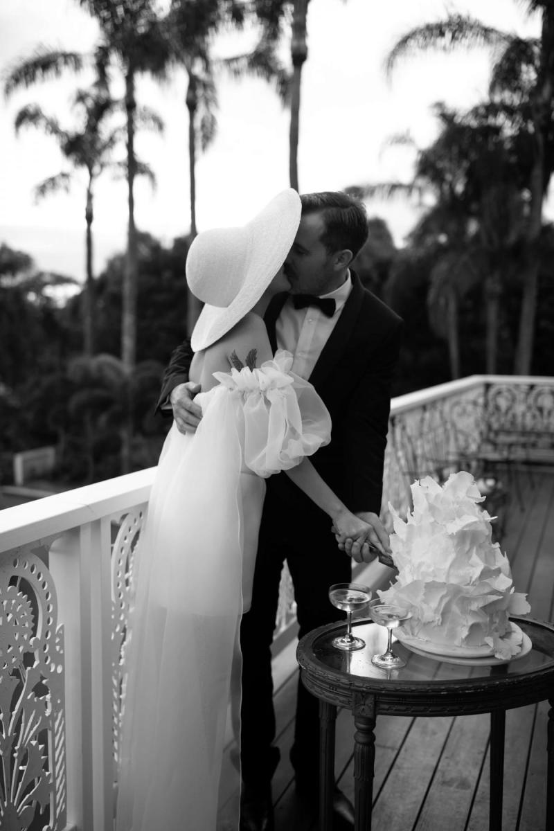 Real bride Elle Costello wears the Brie gown by Karen Willis Holmes, to her small wedding ceremony at Fins Plantation House