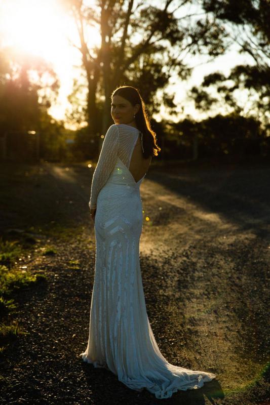 Bride wears Cassie gown by Karen Willis Holmes-Beaded wedding dress