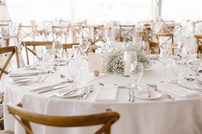 White wedding cake with baby's breath flowers at real bride Ancille's Perth wedding.