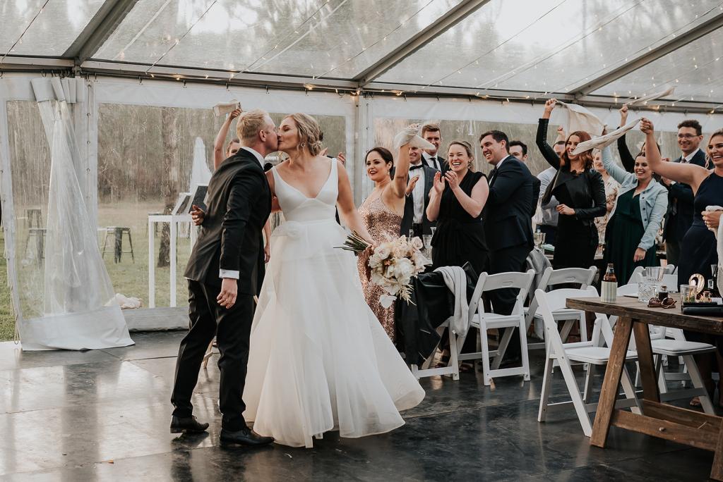Real bride Samantha wears the Aisha gown to her intimate wedding reception; a V-neck A-line wedding dress by Karen Willis Holmes