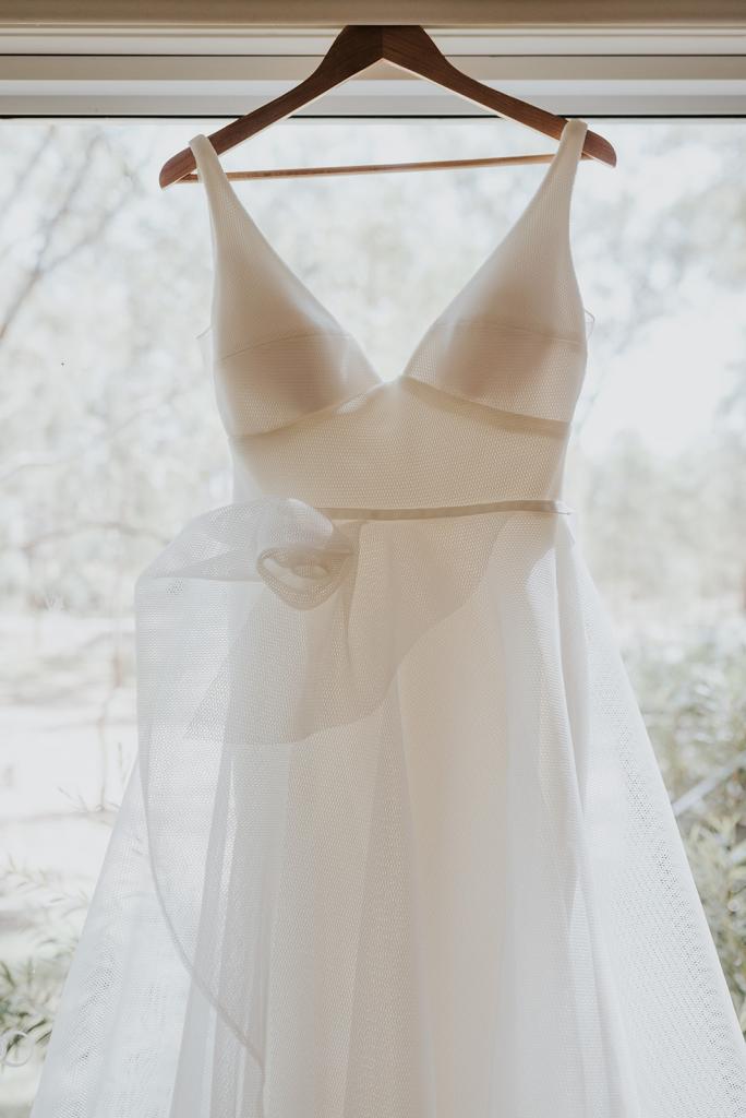 Details of the Aisha gown's floral detailing; a v-neck a-line wedding dress by Karen Willis Holmes.