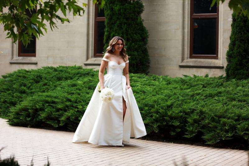 Real bride Valentina wears the timeless traditional Blake Camille wedding dress; a traditional style ballgown wedding dress by Karen Willis Holmes.
