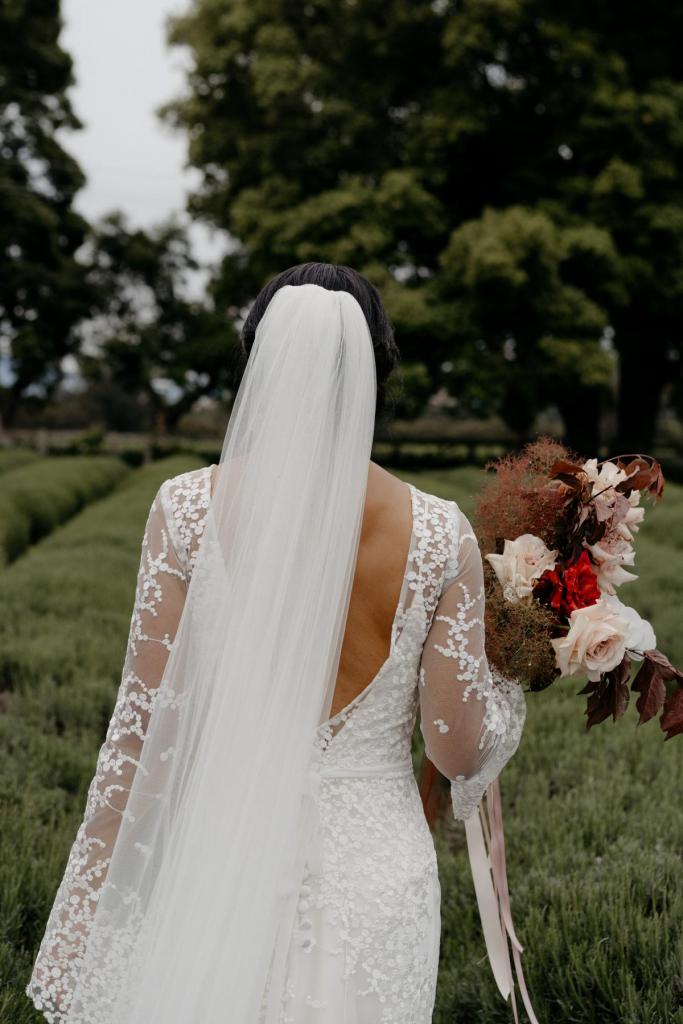 Real bride Saliya in her garden wedding, wearing the Pascale gown & Lucienne Veil; a simple bridal veil by Karen Willis Holmes.