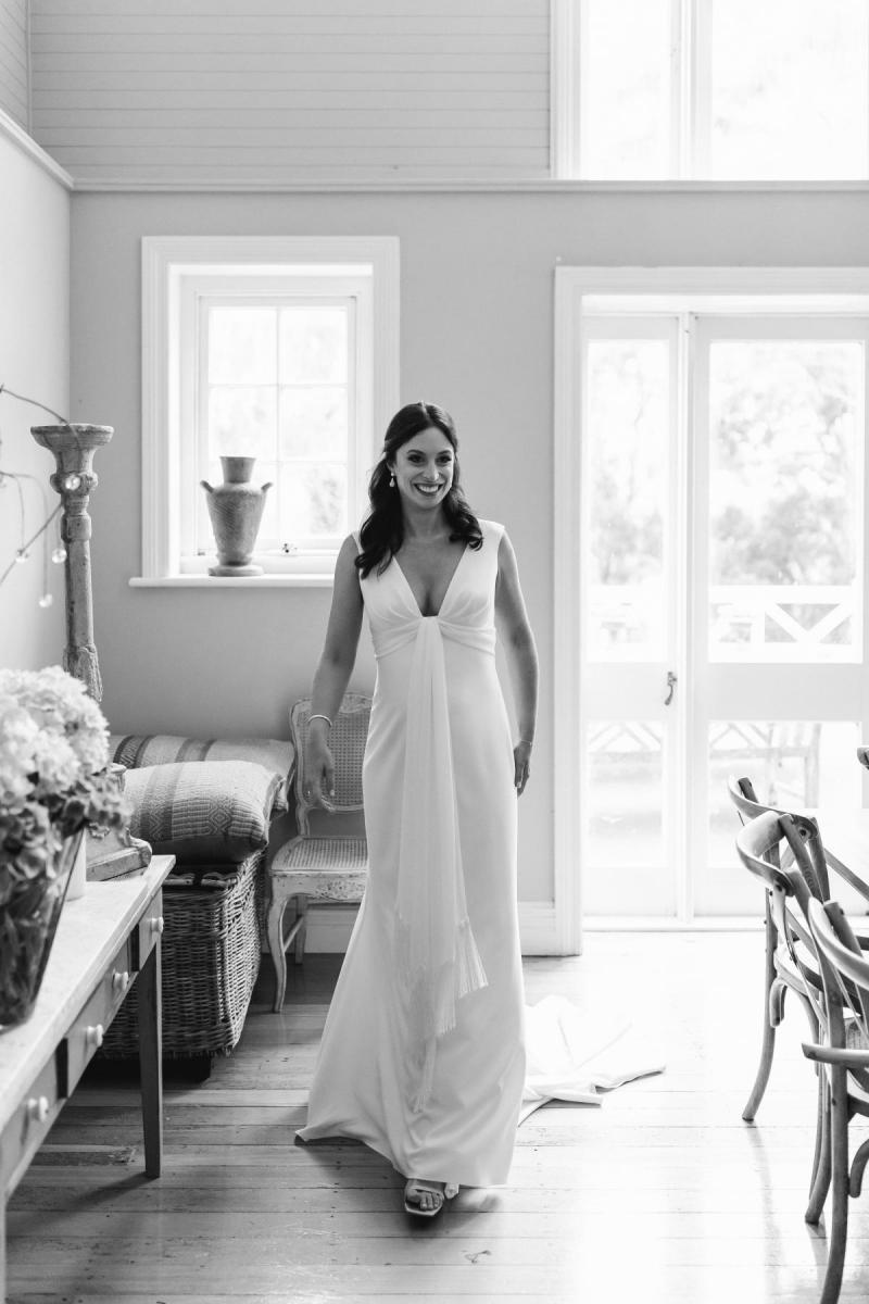 Real bride April getting ready for her Sydney wedding, wearing the Arabella gown by Karen Willis Holmes.