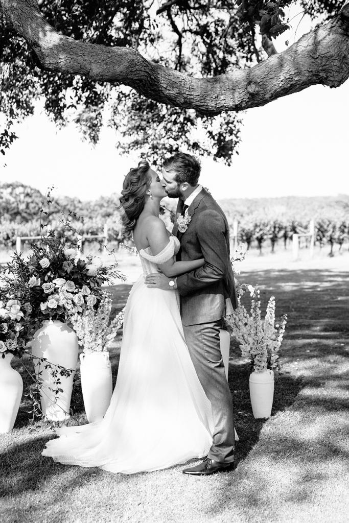 Real bride Jess wearing the Audrey gown; a polka dot wedding dress by Karen Willis Holmes.