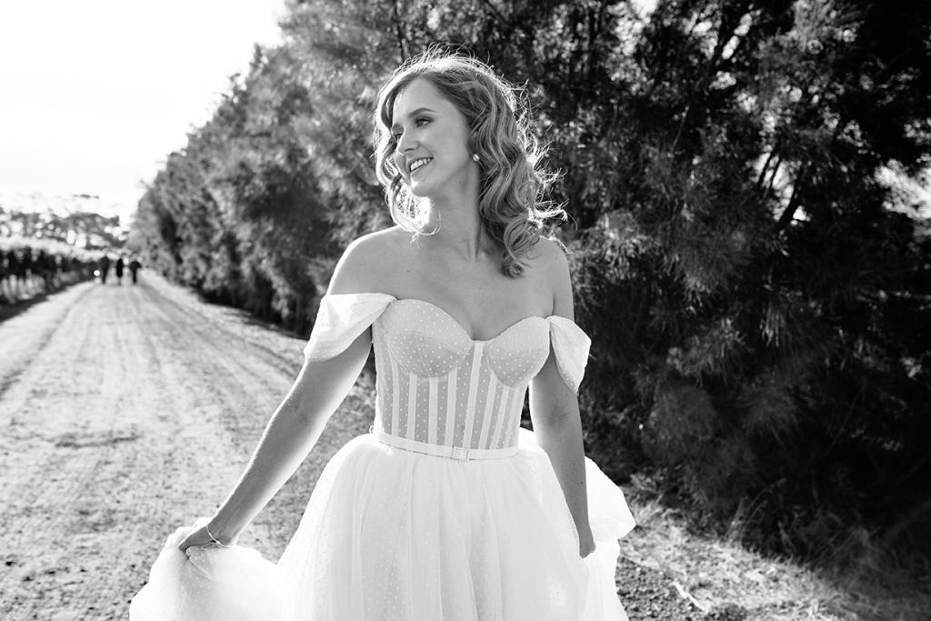 Real bride Jess wearing the Audrey gown; a polka dot wedding dress by Karen Willis Holmes.