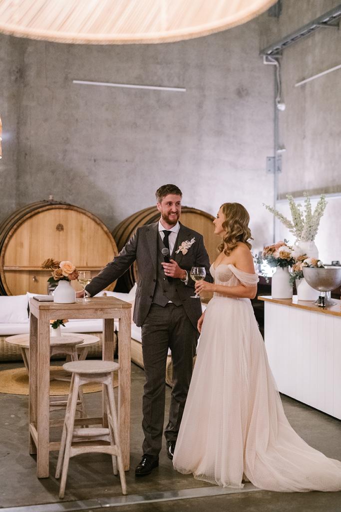 Real bride Jess wearing the Audrey gown; a polka dot wedding dress by Karen Willis Holmes.