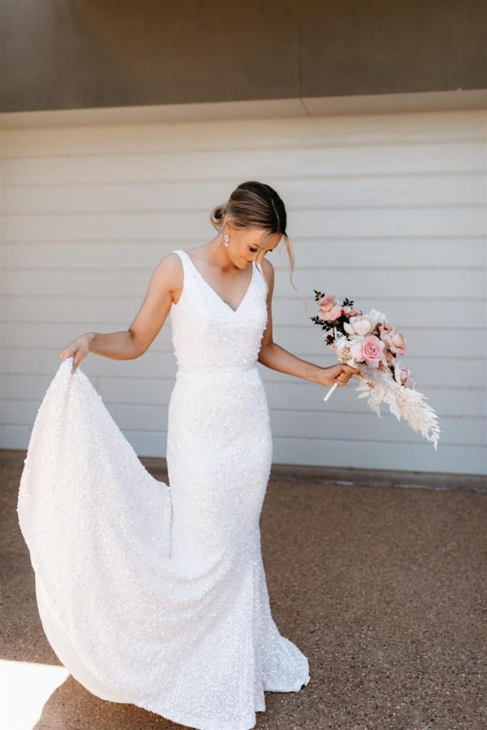 Real bride Bre wears the Lola gown; a beaded fit n flare wedding dress for the modern bride, by Karen Willis Holmes.