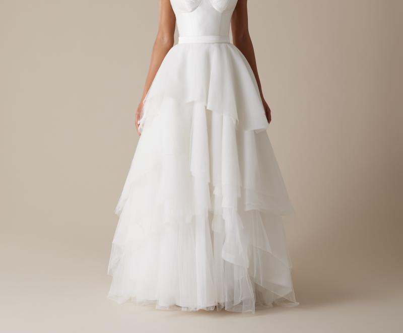 The Marina skirt by Karen Willis Holmes, a tiered, raw edge tulle A-Line wedding dress skirt with Blake bodice.