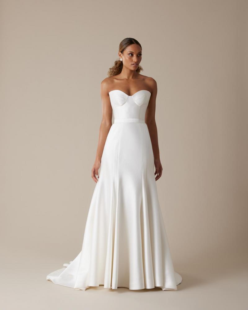 The Blake bodice by Karen Willis Holmes, a simple bustier wedding dress bodice paired with the glam Prea skirt.