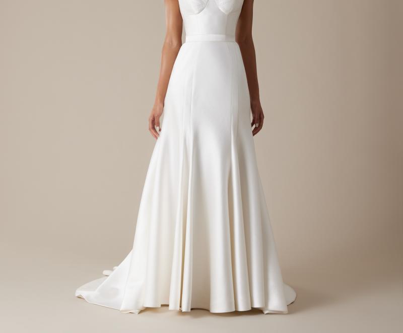The Prea skirt by Karen Willis Holmes, a fit and flare, fish tail wedding dress skirt.