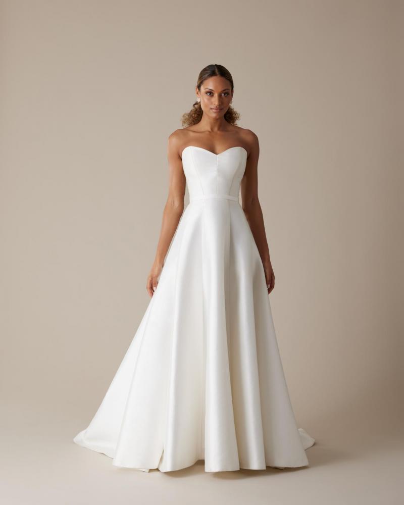 The Kitty bodice by Karen Willis Holmes, a simple strapless sweetheart wedding dress bodice paired with the aline Nina skirt