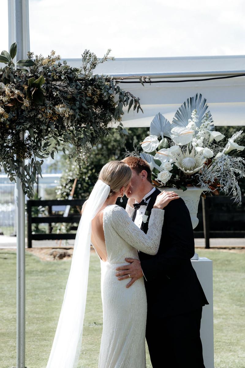 KWH real bride Hannah's welcome sign to the wedding ceremony.