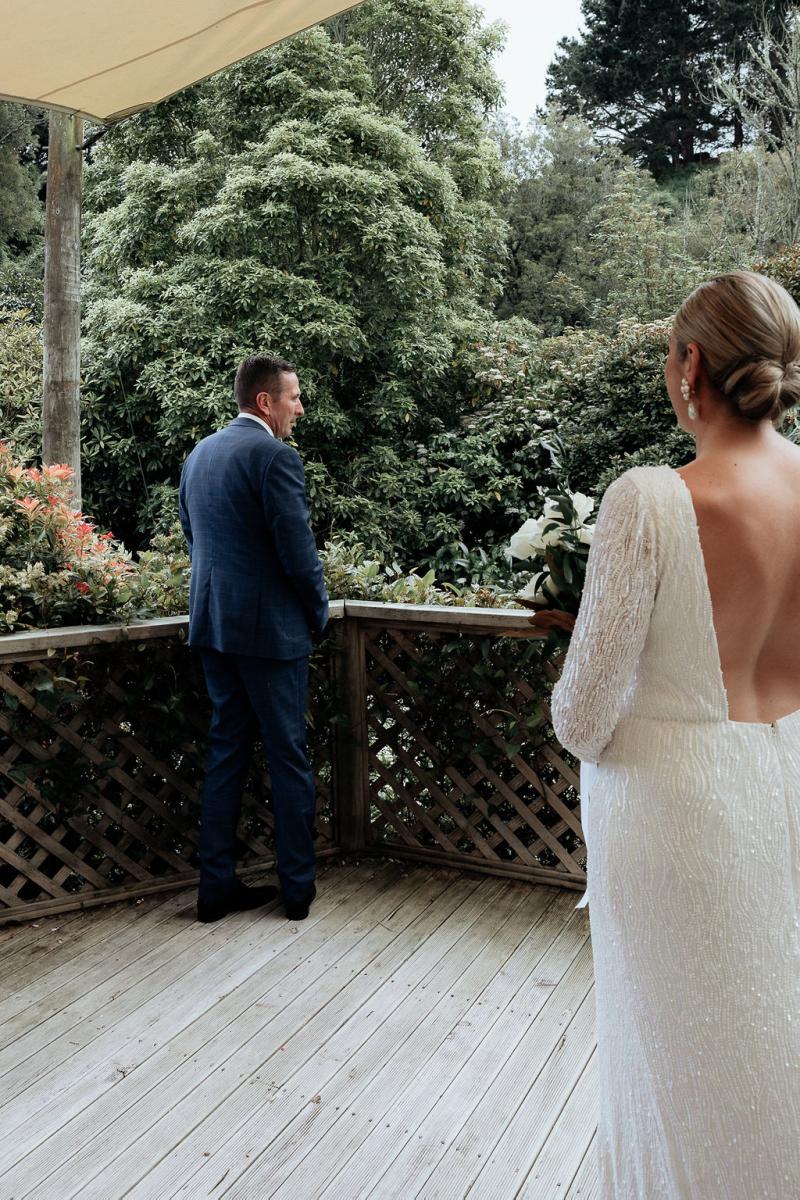 KWH Real bride, Hannah's Margareta gown hangs in the door way along with her bridesmaids dressing gowns.