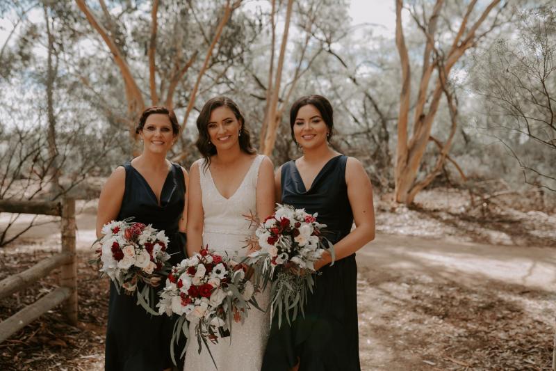 KWH real bride Amber with her bridesmaids. She dons the ivory sequin Olympia wedding dress with modest train.
