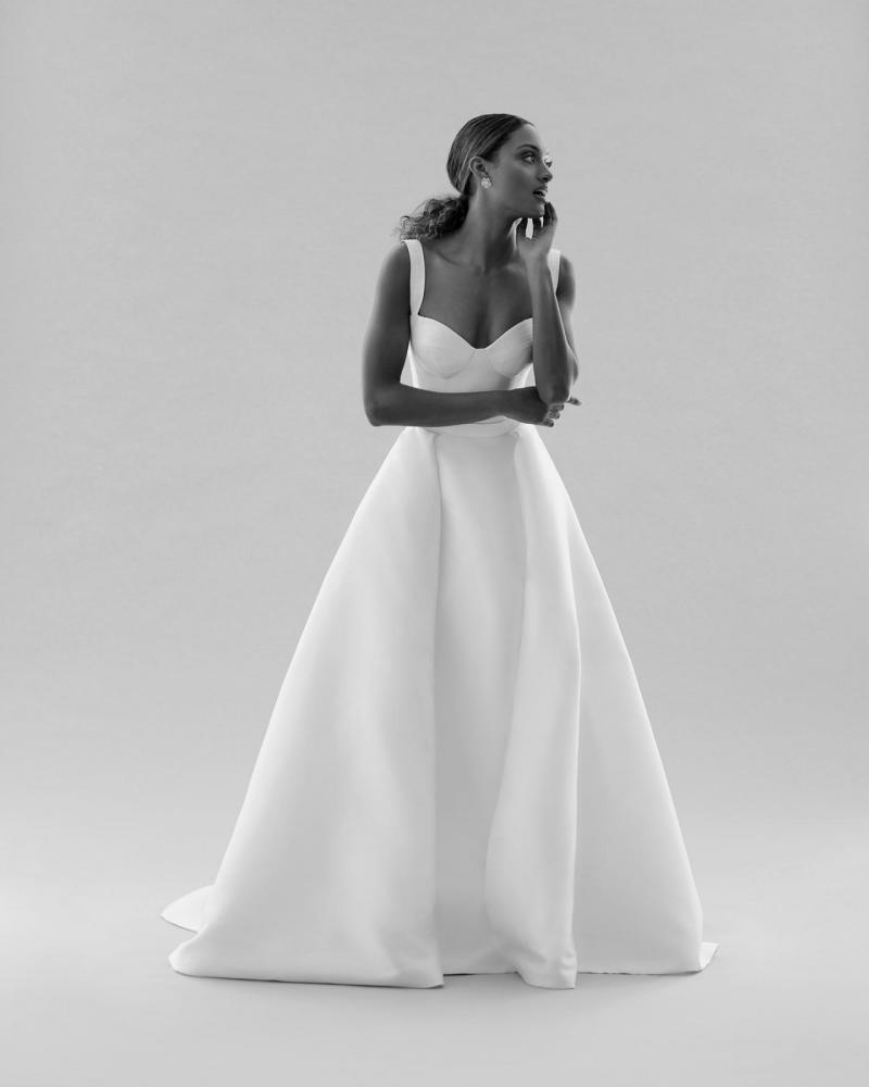 The Blake bodice by Karen Willis Holmes, a simple bustier wedding dress bodice with straps and paired with the Elizabeth skirt. B&W image