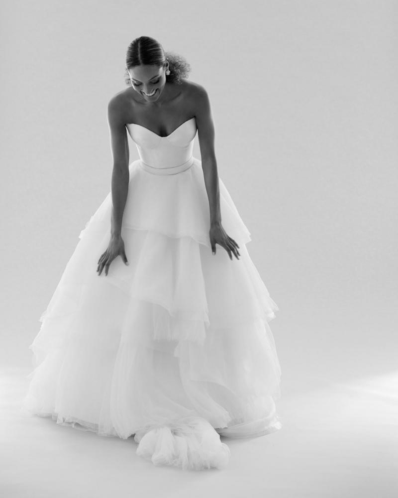 The Blake bodice by Karen Willis Holmes, a simple bustier wedding dress bodice paired with the tulle Marina skirt. B&W image
