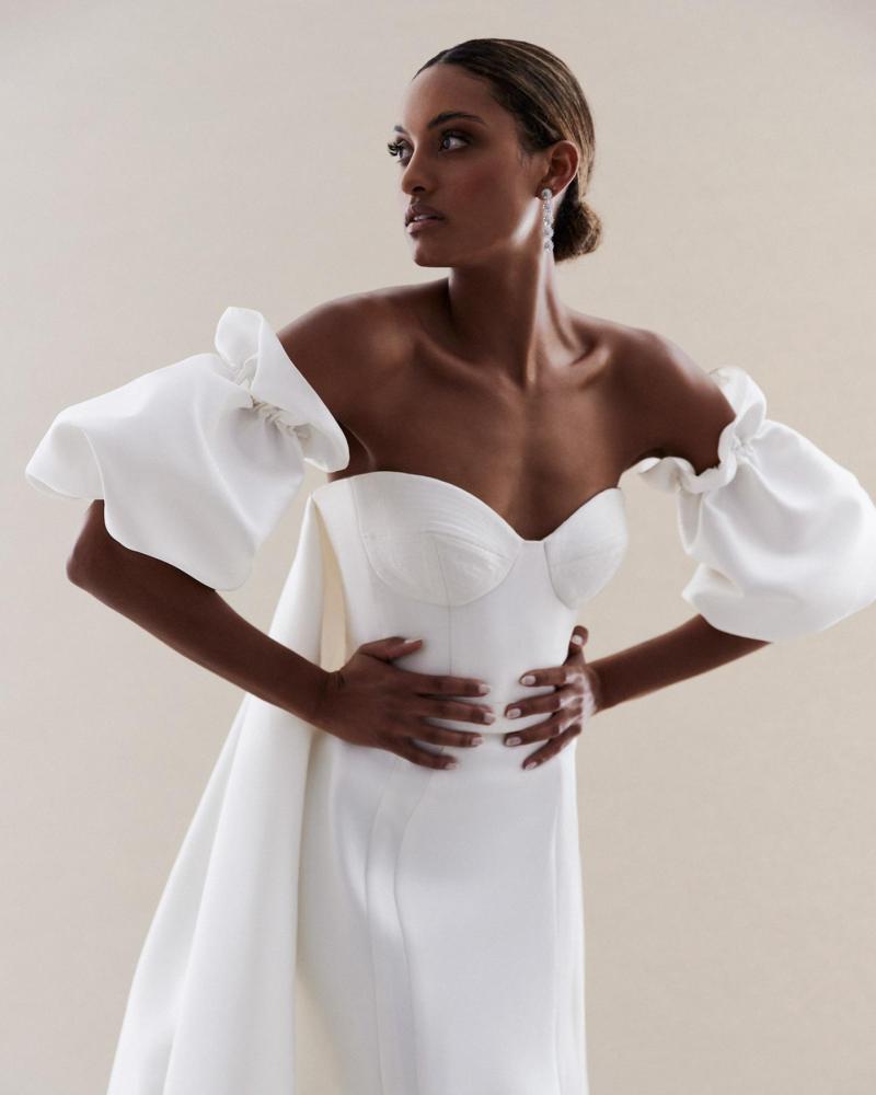The Blake bodice by Karen Willis Holmes, a simple bustier wedding dress bodice with Puff sleeves and Lindy train. Up close shot