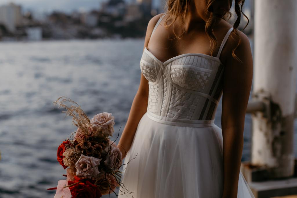Real bride Gaby wears the Scarlett gown harbourside; a strapless corset wedding dress by Karen Willis Holmes.