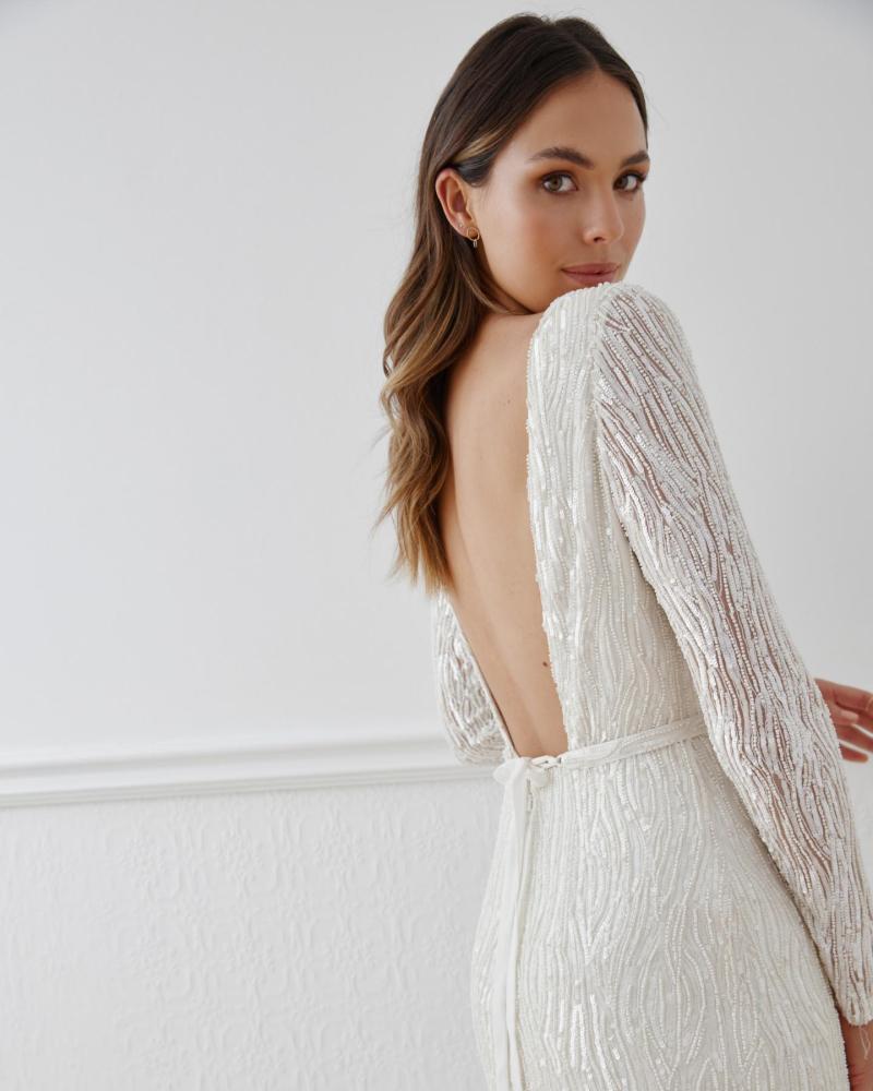 The Margareta gown by Karen Willis Holmes, high neck long sleeve sequin wedding dress