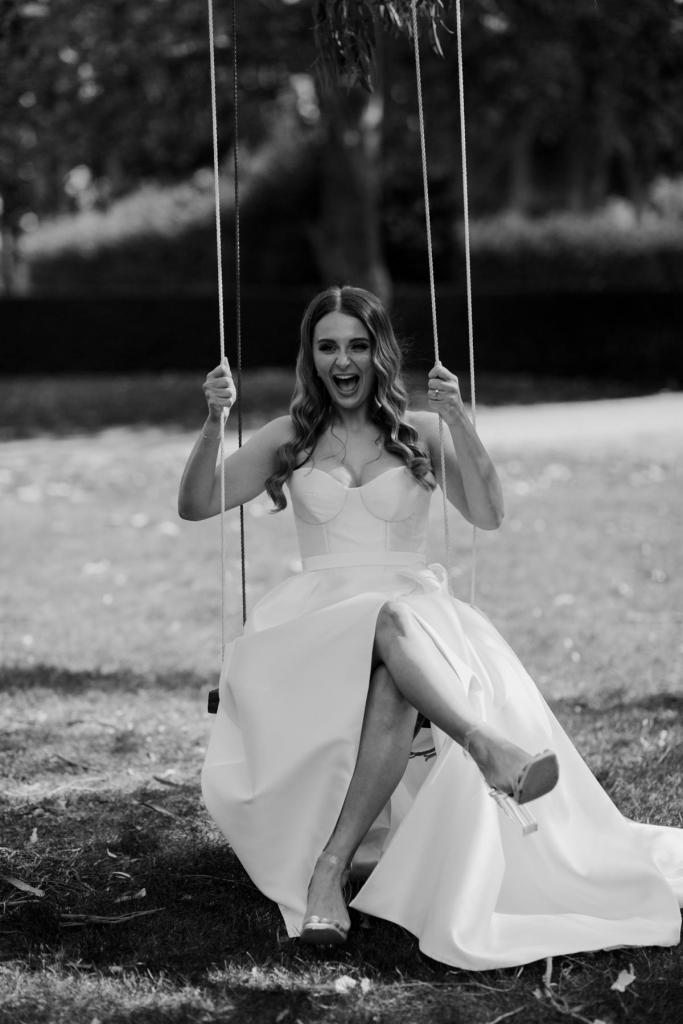 KWH real bride Elke swings in her Blake Camille wedding dress with bustier bodice and aline, high split skirt