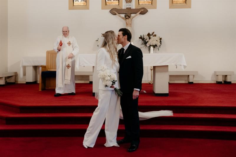KWH real bride Demi wears the ultra chich Charlie Danielle bridal suit to her church elopement.