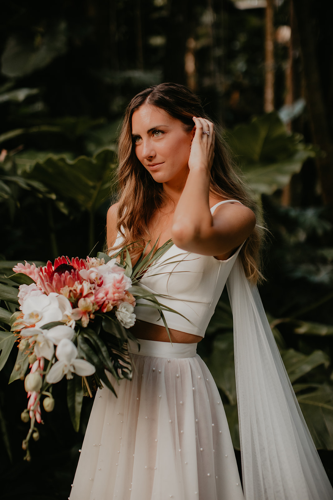 KWH real bride Jana stands in her two piece Erin and Lea set with crepe top and pearl tulle skirt.