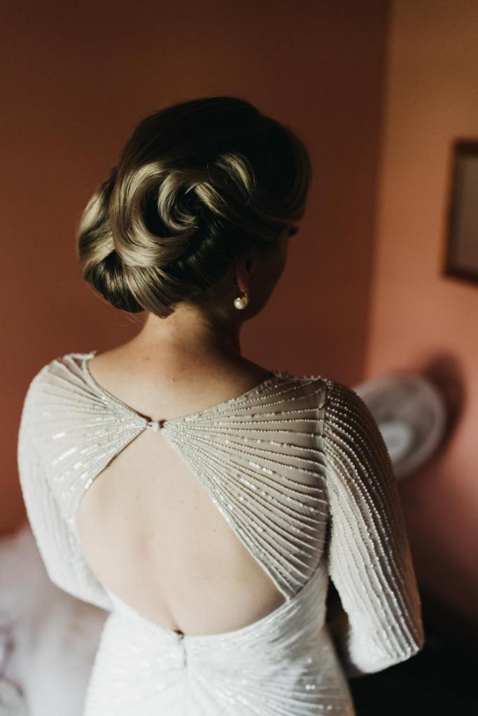 KWH real bride Nicola's vintage bridal hair. She dons the handbeaded Cassie wedding dress with keyhole back.