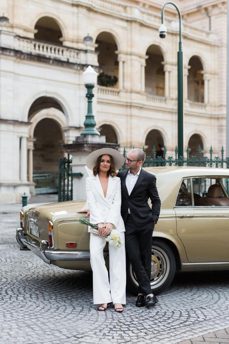 Megan Kelly and daughter wears a Karen Willis Holmes Bridal Suit- The Charlie Jacket and Danielle pant to Brisbane Elopement