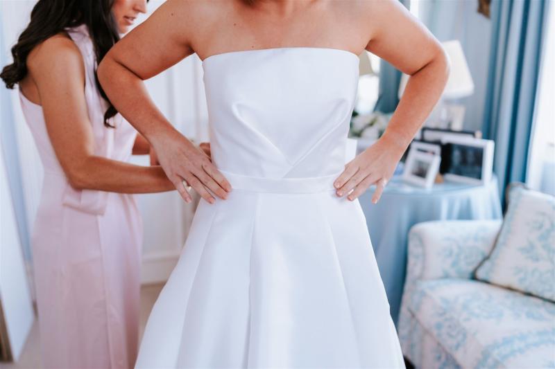 KWH real bride Annabelle standing in her Jacqueline Melanie gown, a modern bridal ballgown with fitted bodice.