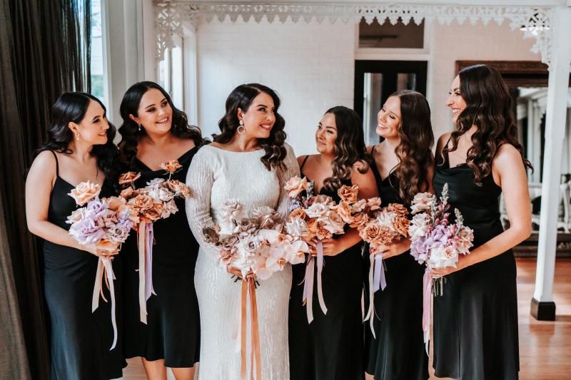 KWH real bride Katherine's Margareta gown hanging; she is a modern beaded wedding dress.